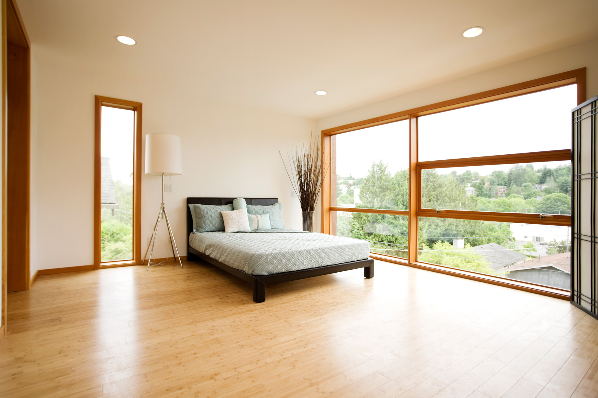 modern style bedroom with bamboo flooring 